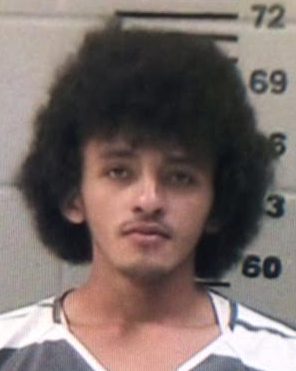 Prior mugshot of murder suspect Aníbal Mejia. 
